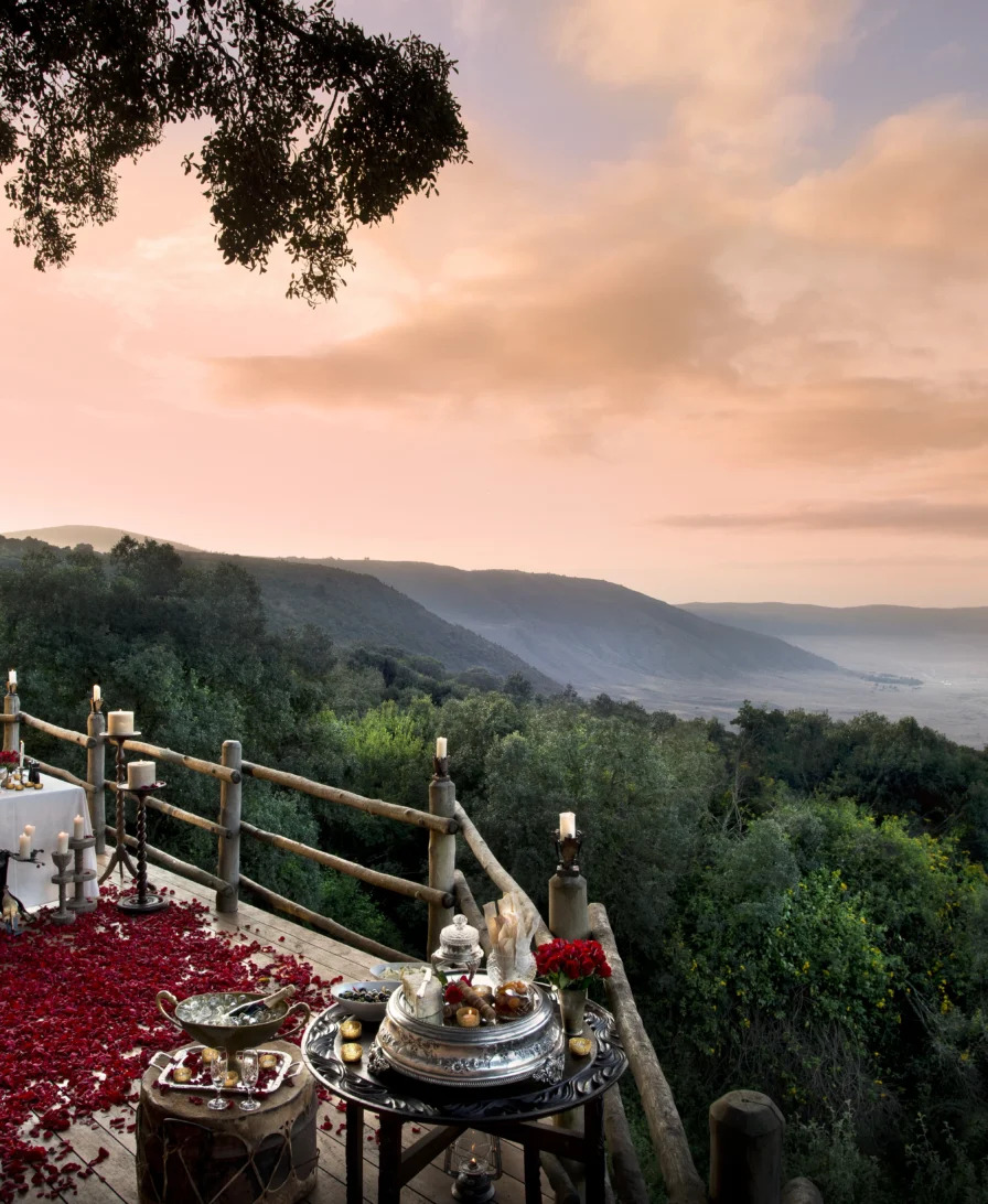 Luxury safari camp overlooking the Serengeti plains at golden hour